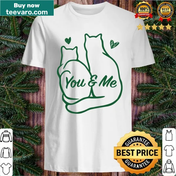 Illustration of two cute cats with the text 'You & Me' for Christmas.