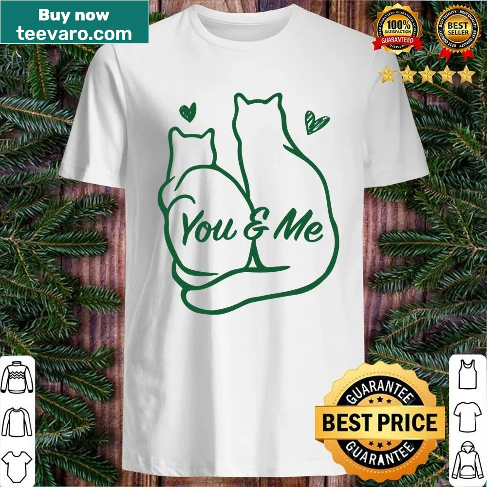 Illustration of two cute cats with the text 'You & Me' for Christmas.