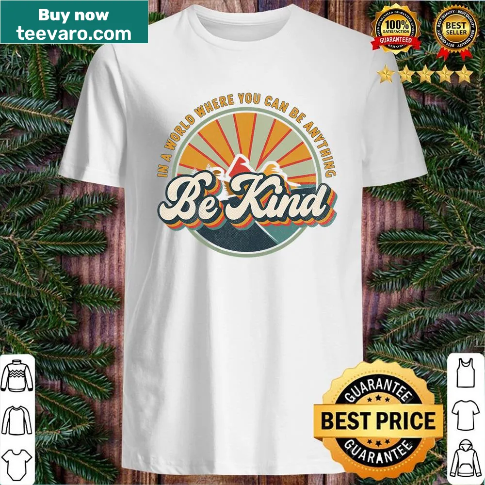 Vintage-style kids shirt featuring a rainbow and the message Be Kind.