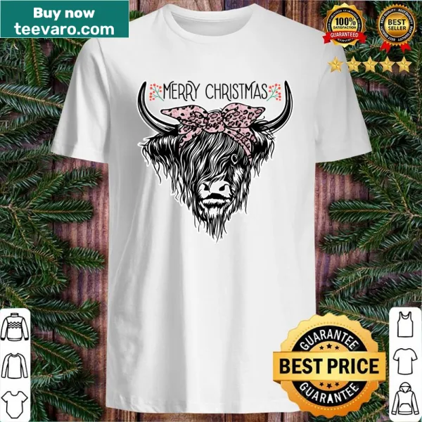 Illustrated Highland cow on a Christmas-themed shirt