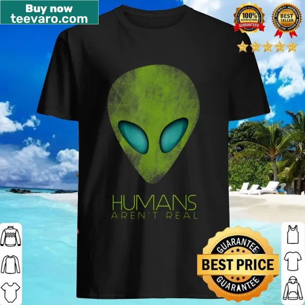 Cute alien graphic with 'Humans Aren't Real' text on a shirt