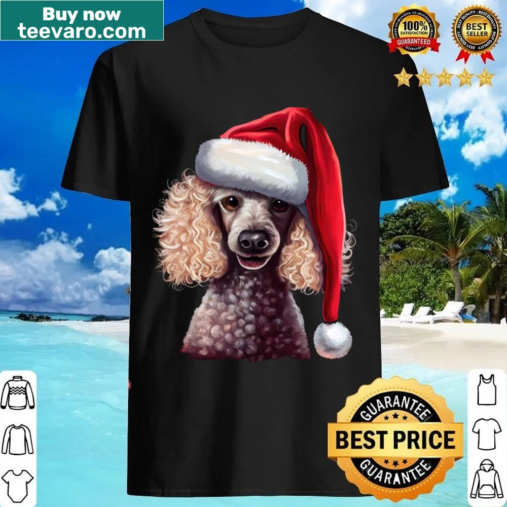 Adorable poodle wearing Santa's hat on a shirt.