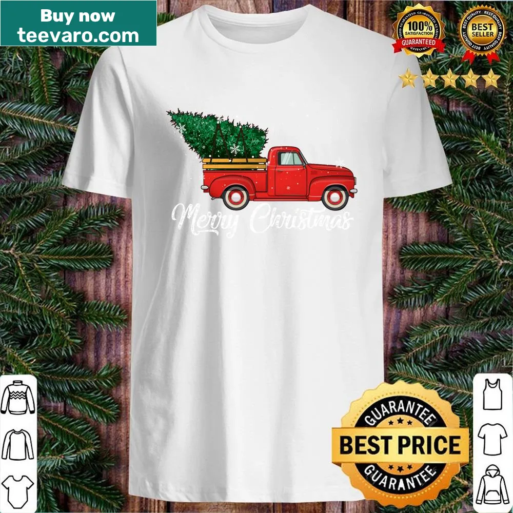 Vintage red truck shirt carrying a Christmas tree