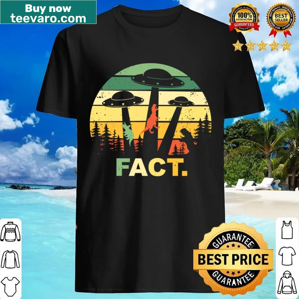 Vintage-style shirt with a dinosaur being abducted by a UFO