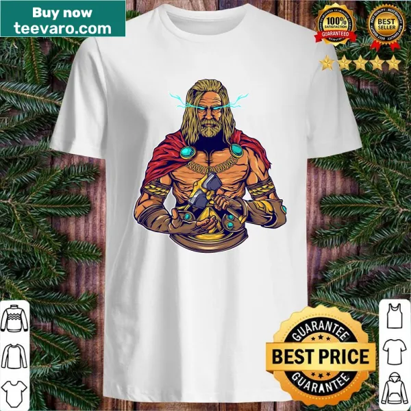 Shirt featuring an illustration of a Nordic man with a hammer