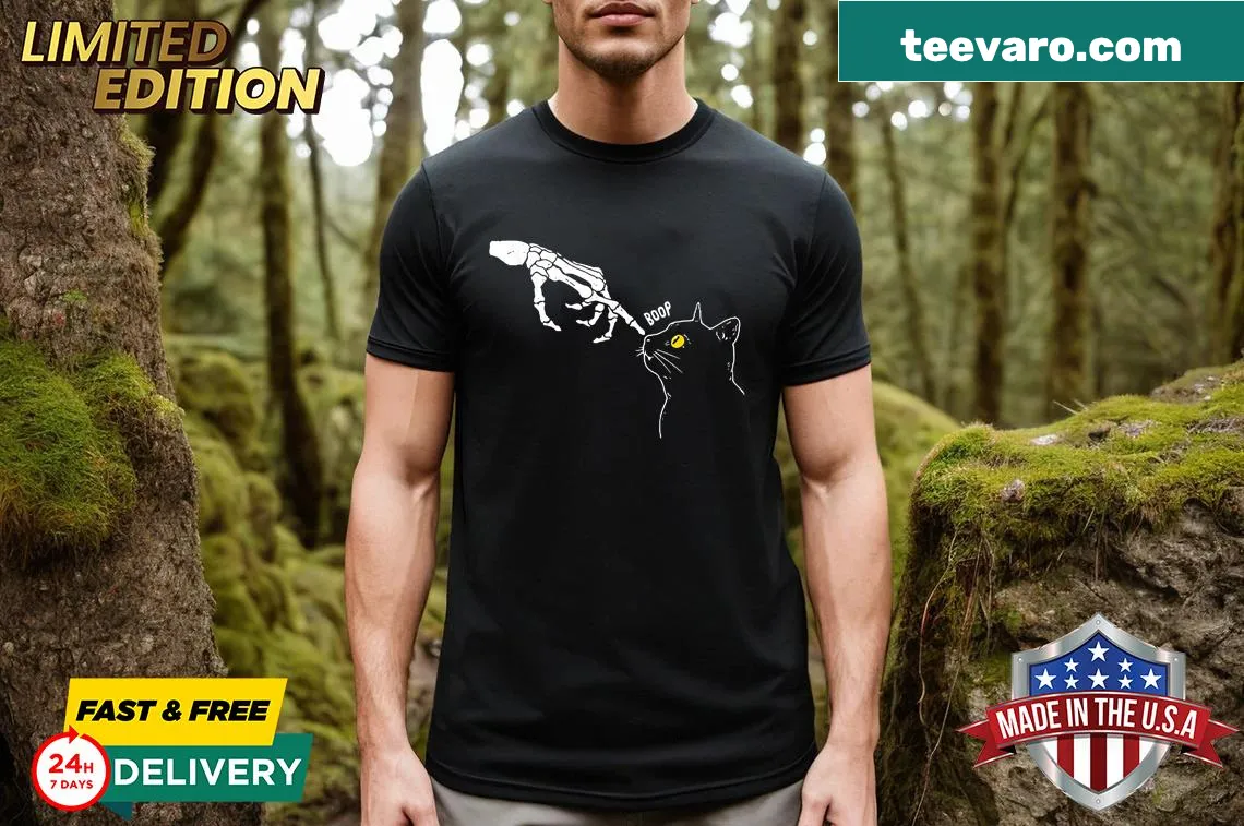 Cartoon skeleton hand booping a black cat graphic for Halloween — on a men's t-shirt