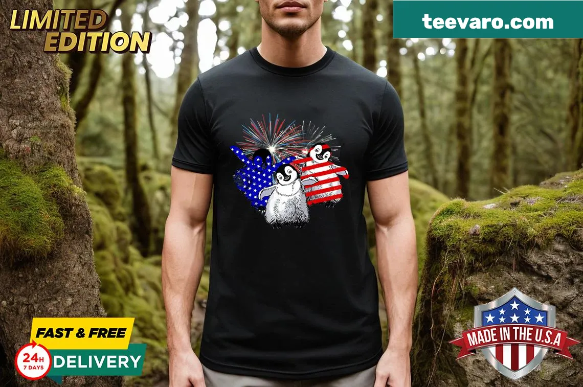 Fourth of July penguin fireworks graphic t-shirt — on a men's t-shirt