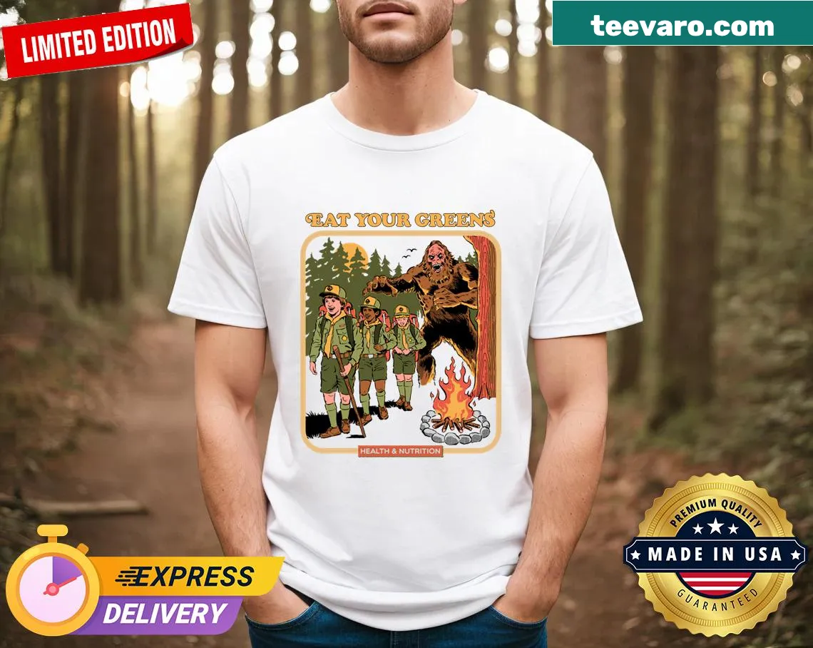 Playful t-shirt featuring cartoon vegetables and 'Eat Your Greens' text — on a men's t-shirt