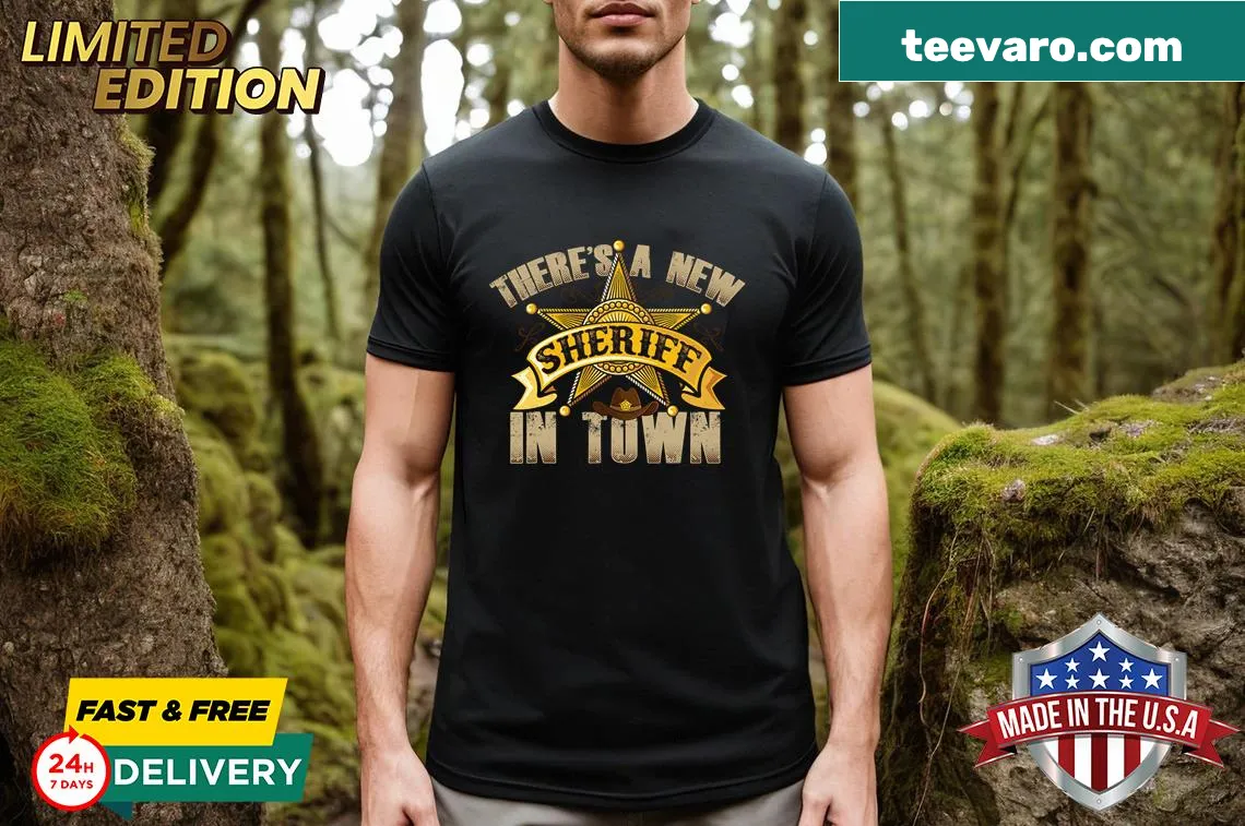 Sheriff badge graphic with text 'There's A New Sheriff In Town' on t-shirt — on a men's t-shirt