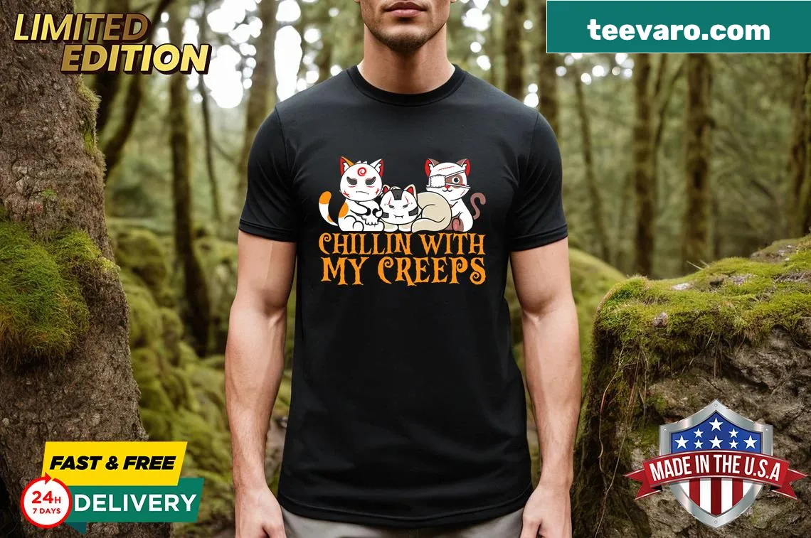 Halloween T-shirt with a playful cat serial killer graphic. — on a men's t-shirt