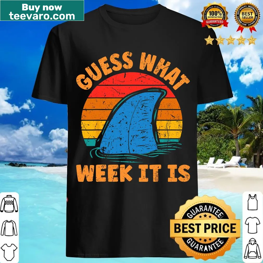 Funny shark-themed t-shirt with the phrase 'Guess What Week It Is' — on a men's t-shirt