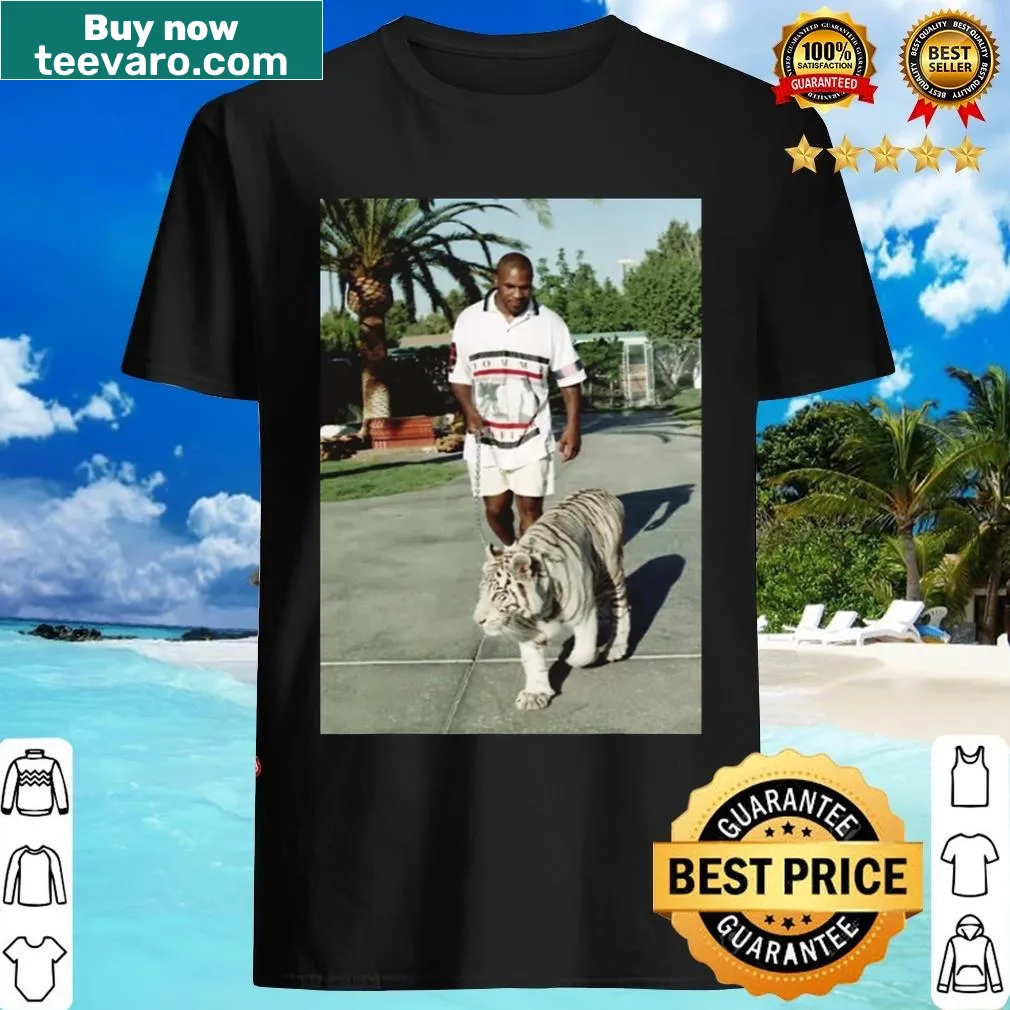 Vintage t-shirt featuring a graphic of boxing legend Mike Tyson. — on a men's t-shirt