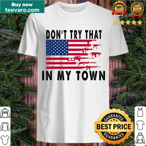 Vintage t-shirt with the phrase 'Don't Try That In My Town' over an American flag design.