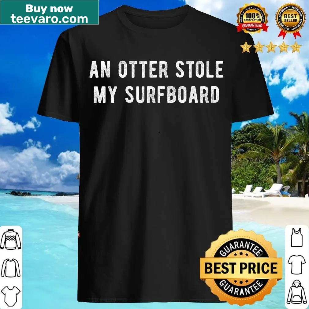 Cute cartoon otter graphic on a surfing-themed T-shirt — on a men's t-shirt