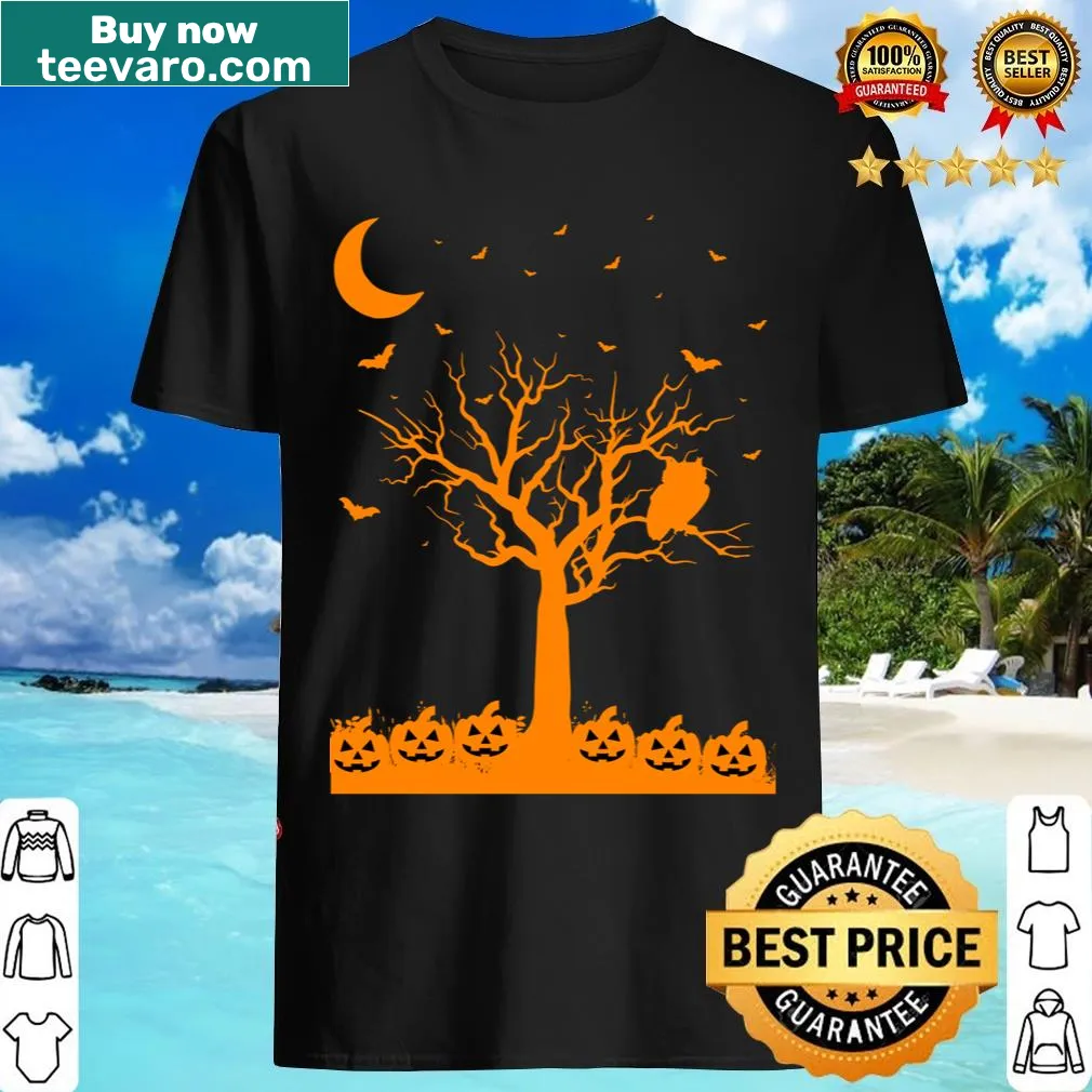 Haunted house and witches tree design on a Halloween-themed t-shirt. — on a men's t-shirt