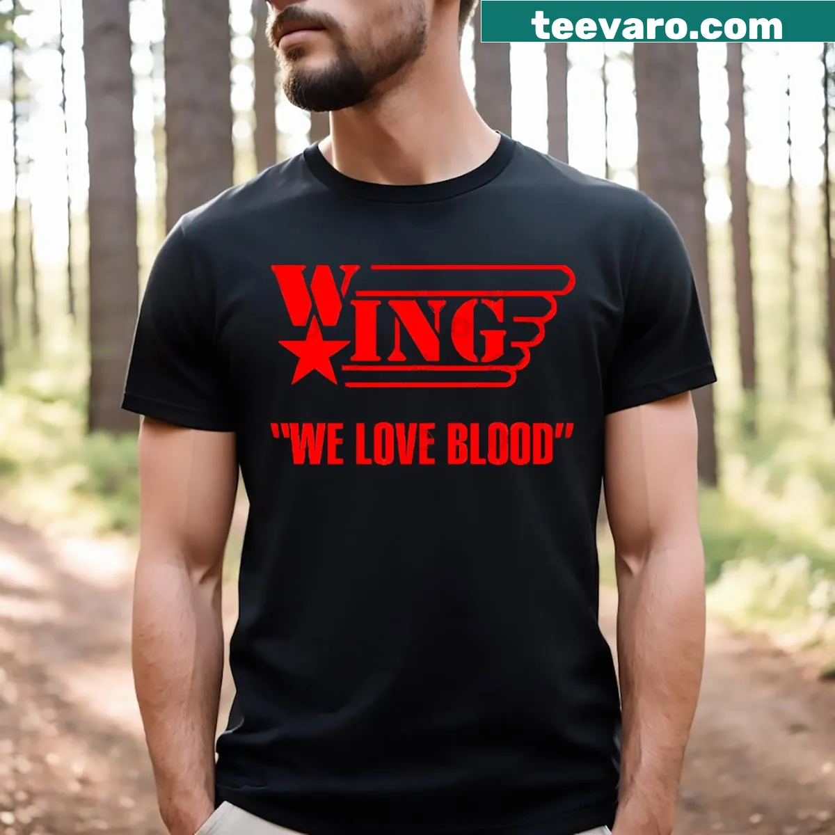 Wrestling t-shirt with humorous 'Wing We Love Blood' text — on a men's t-shirt