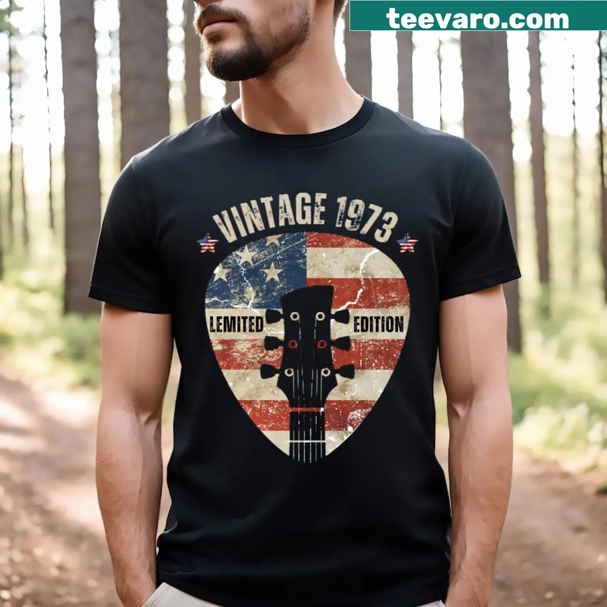 Vintage 1973 guitar player USA flag t-shirt — on a men's t-shirt