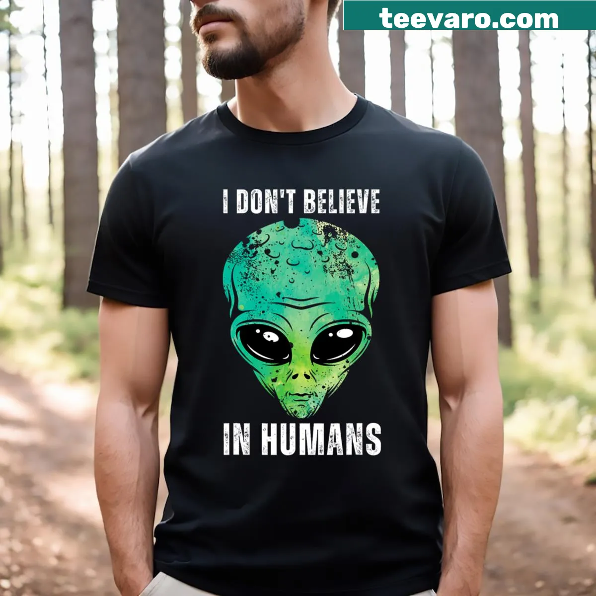 Playful alien face graphic on a Halloween tee — on a men's t-shirt