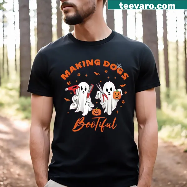 Whimsical dog groomer Halloween shirt with playful dogs