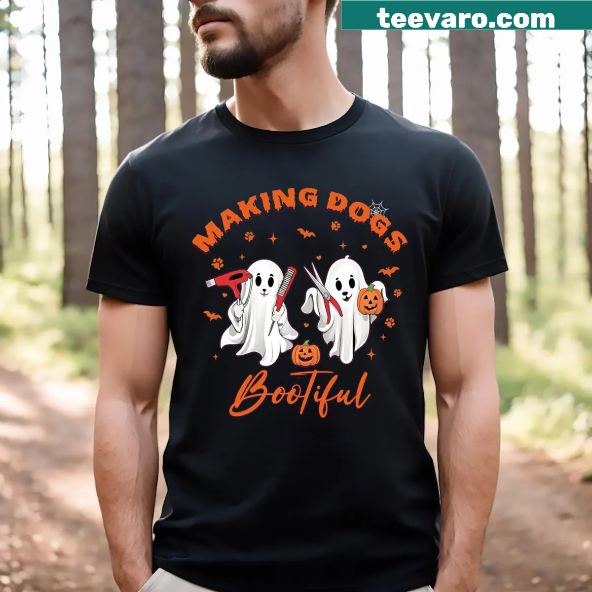 Whimsical dog groomer Halloween shirt with playful dogs — on a men's t-shirt