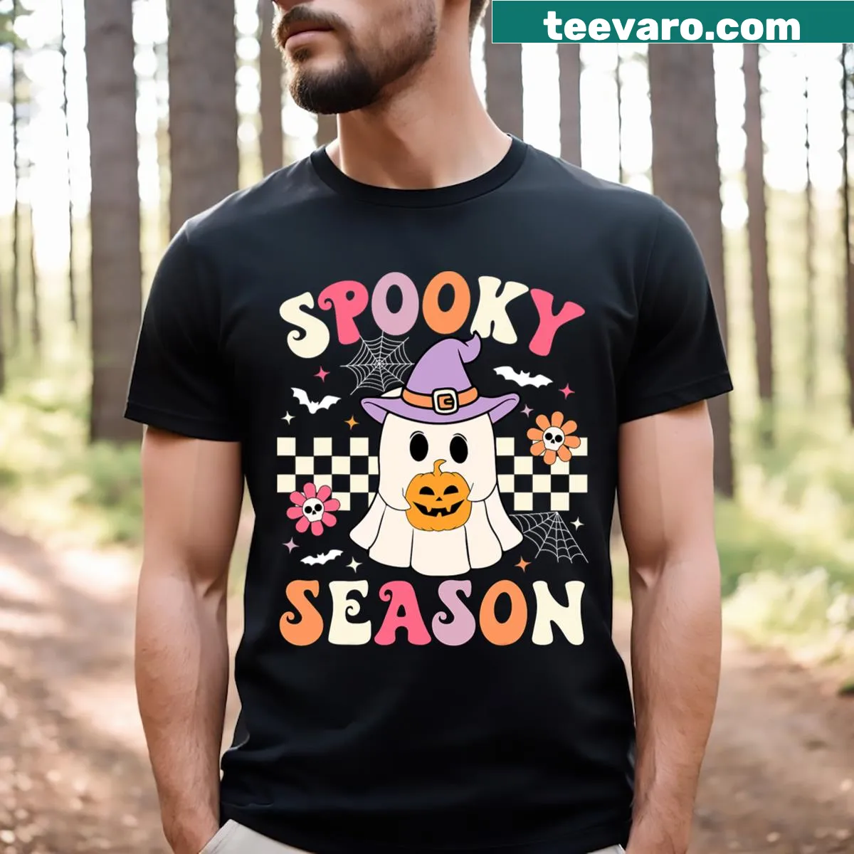 Retro ghost holding a pumpkin in a Halloween-themed t-shirt — on a men's t-shirt