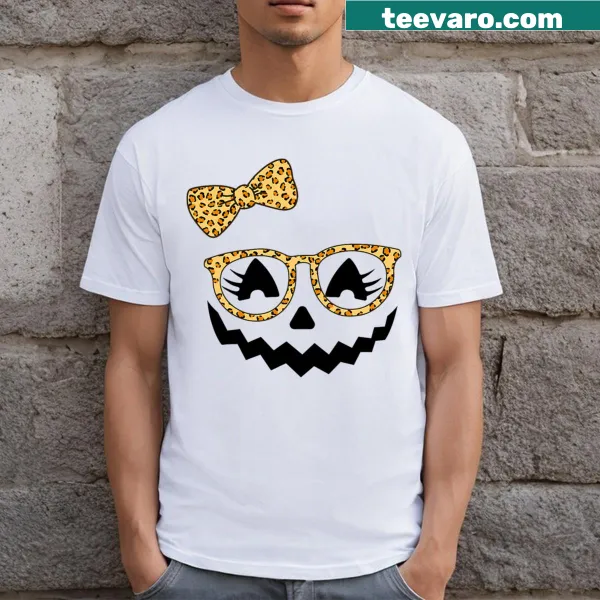 Cute Halloween T-shirt with a Jack O' Lantern design and eyelashes