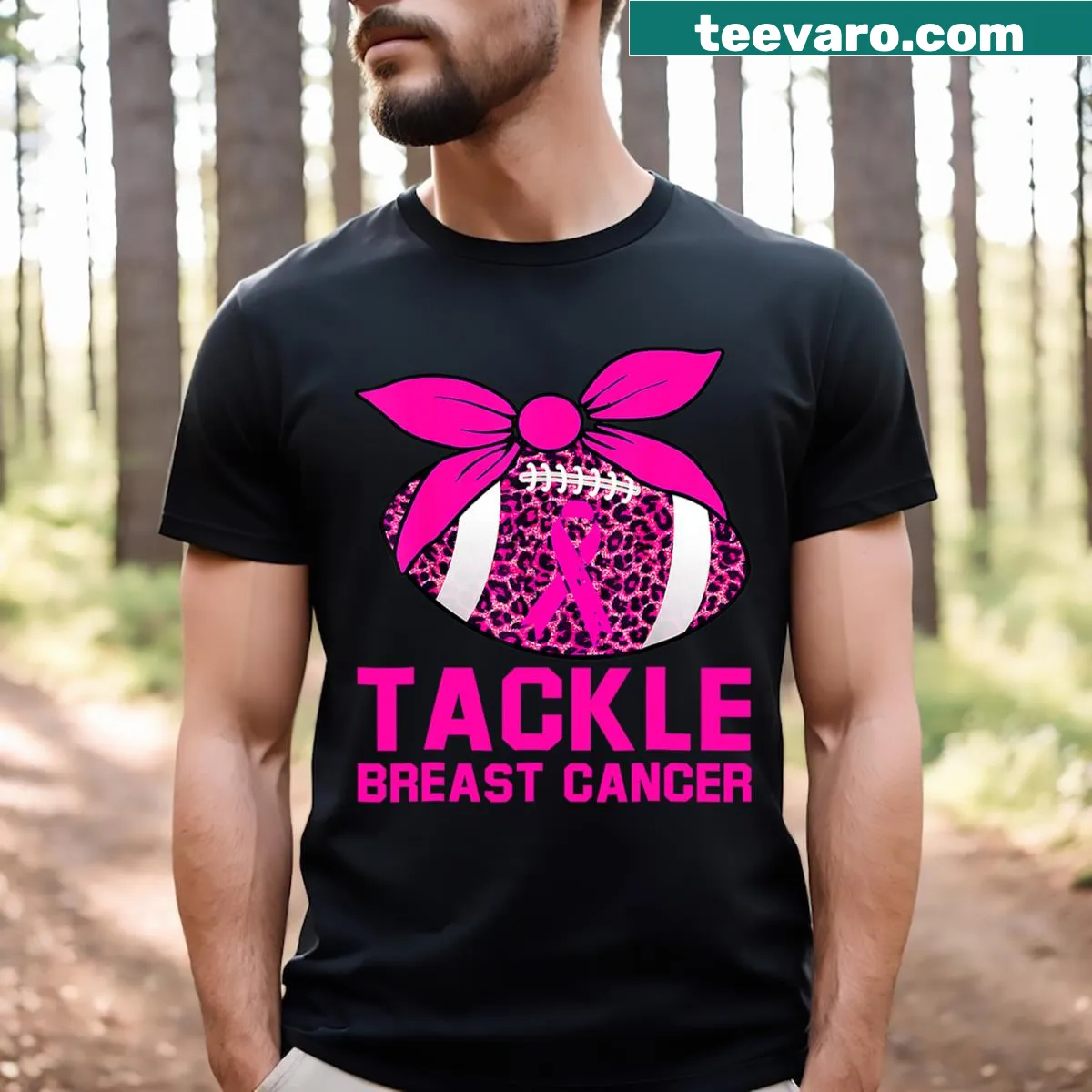Football and pink ribbon graphic supporting breast cancer awareness — on a men's t-shirt