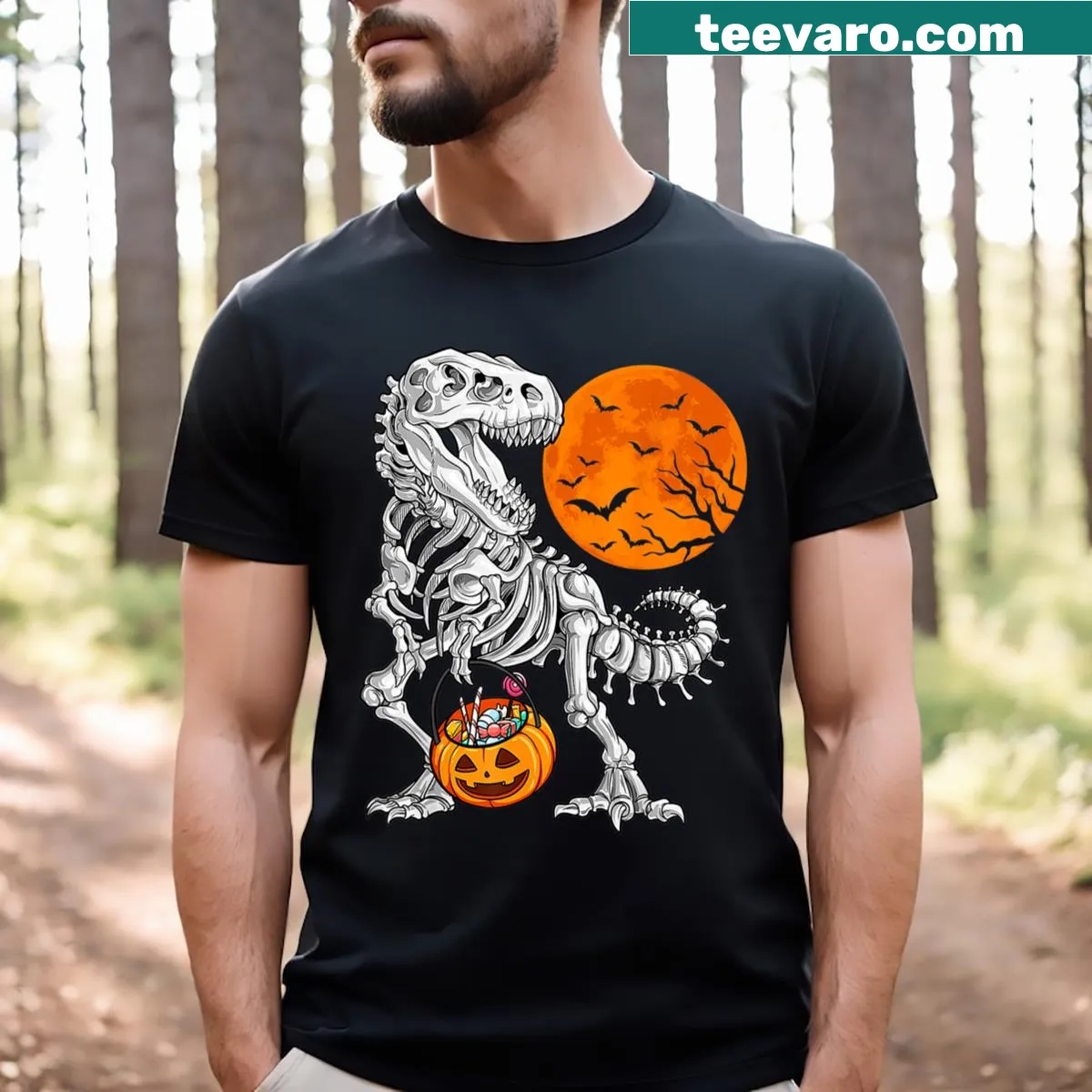 Dinosaur skeleton T-Rex graphic with pumpkin and moon on t-shirt — on a men's t-shirt
