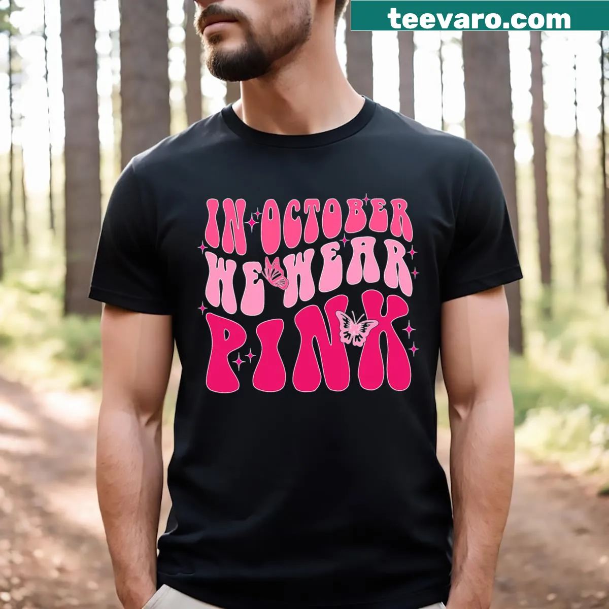 Retro Vintage Breast Cancer Awareness T-shirt with 'In October We Wear Pink' text — on a men's t-shirt