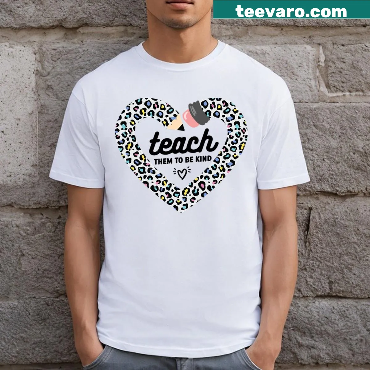 Teacher shirt with 'Teach Them To Be Kind' text and leopard print — on a men's t-shirt