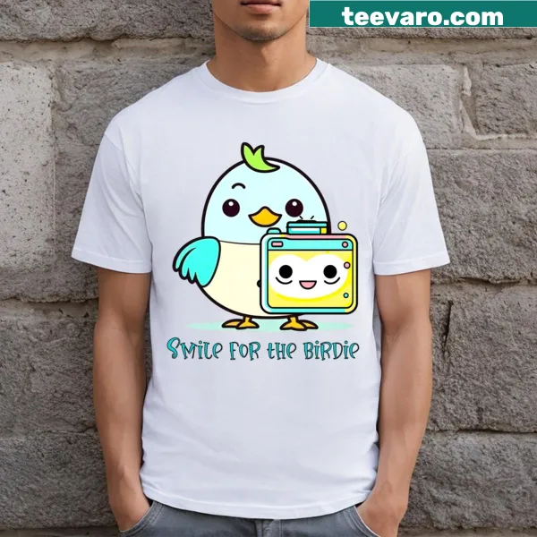 Cute T-shirt with a cheerful bird illustration and 'Smile For The Birdie' text
