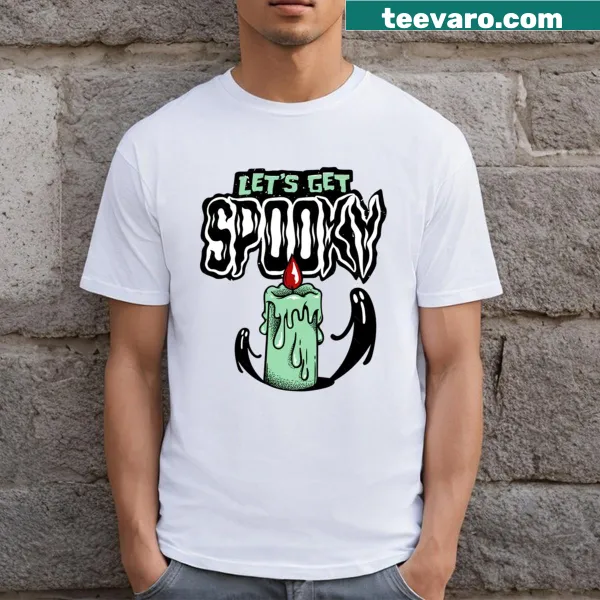 Cute Halloween t-shirt featuring a spooky candle and festive elements