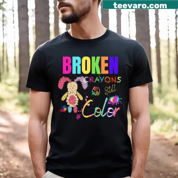 Illustrative T-shirt with 'Broke Crayons Still Color' message