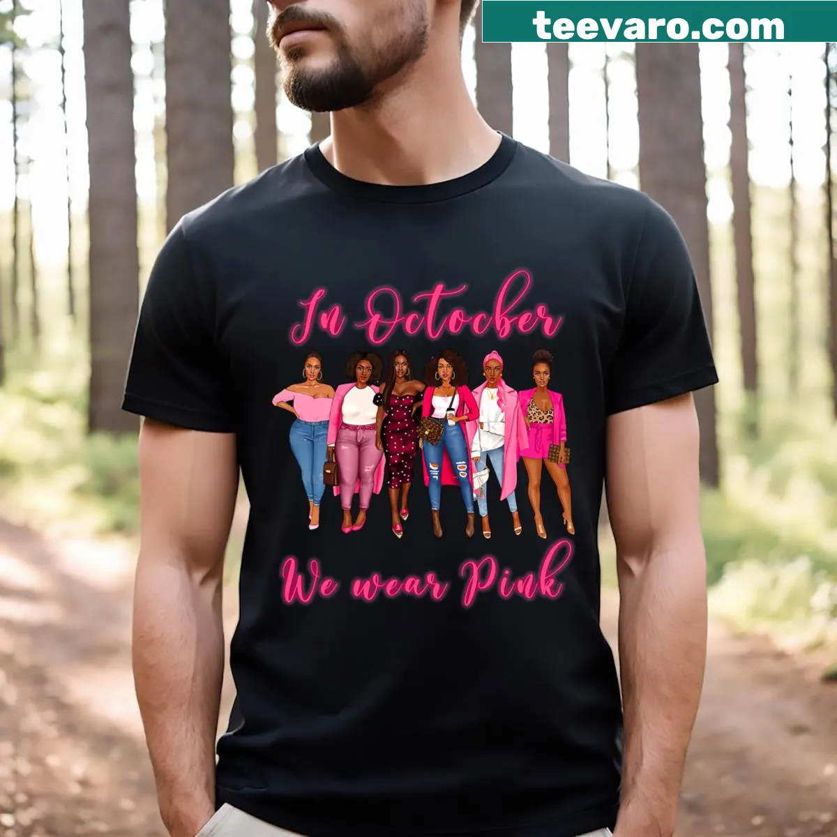 Text reads 'In October We Wear Pink' for breast cancer awareness. — on a men's t-shirt