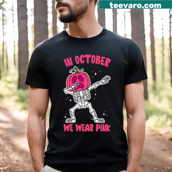 Pumpkin graphic with 'In October We Wear Pink' for breast cancer awareness.