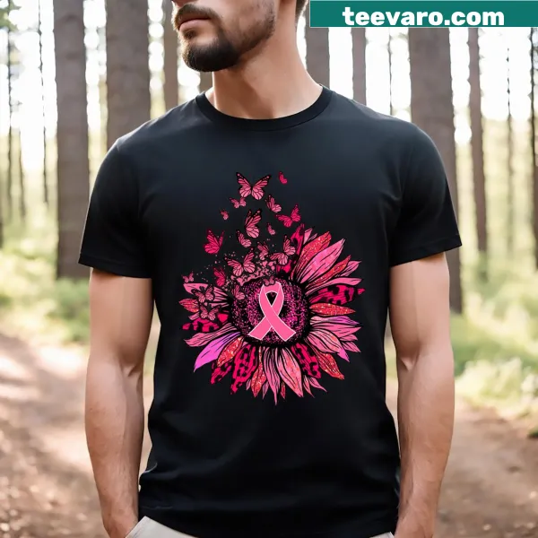 T-shirt with butterfly and pink ribbon design for breast cancer awareness.
