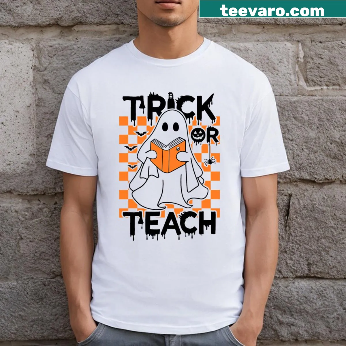 Retro Halloween teacher t-shirt with ghost and 'Trick Or Teach' text — on a men's t-shirt