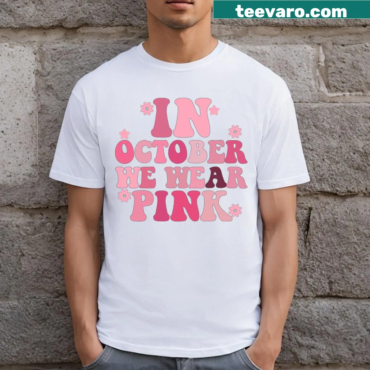 Breast cancer awareness t-shirt with 'In October We Wear Pink' text — on a men's t-shirt