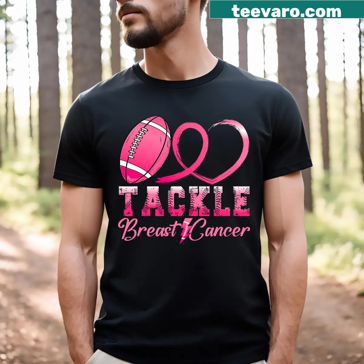 Football graphic with pink ribbon on boys' breast cancer awareness T-shirt — on a men's t-shirt