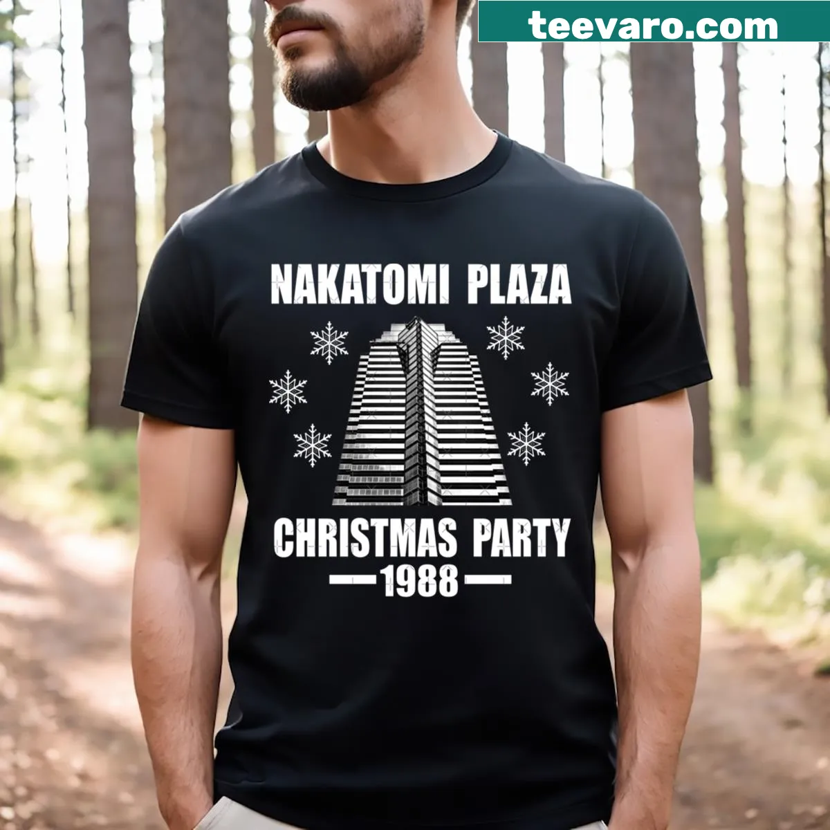 Christmas themed T-shirt featuring Nakatomi Plaza design from 1988. — on a men's t-shirt