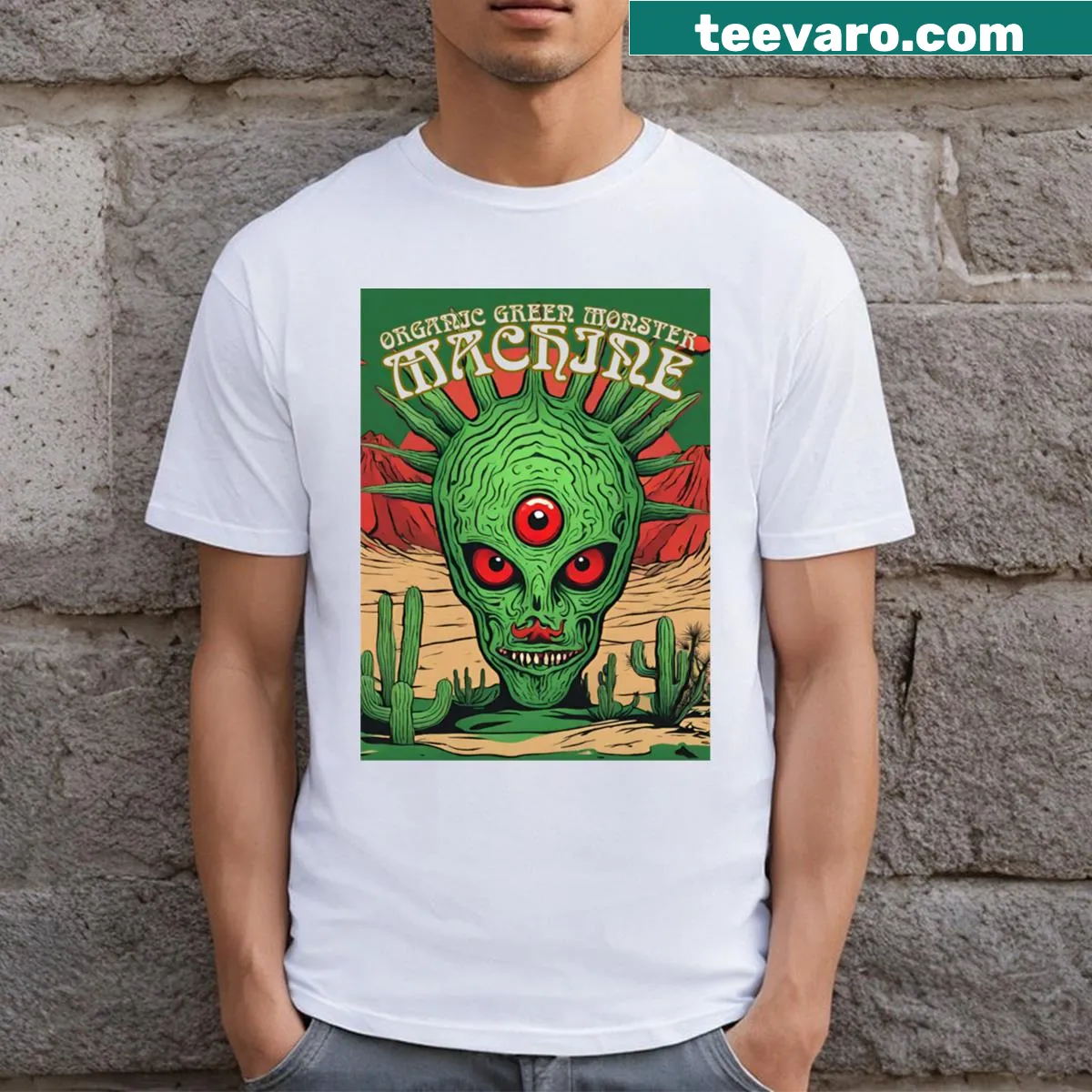 Whimsical T-shirt featuring a friendly alien in a desert setting. — on a men's t-shirt