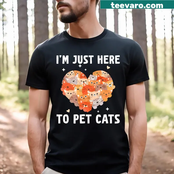 Graphic T-shirt with the phrase 'Just Here To Pet Cats' in playful text