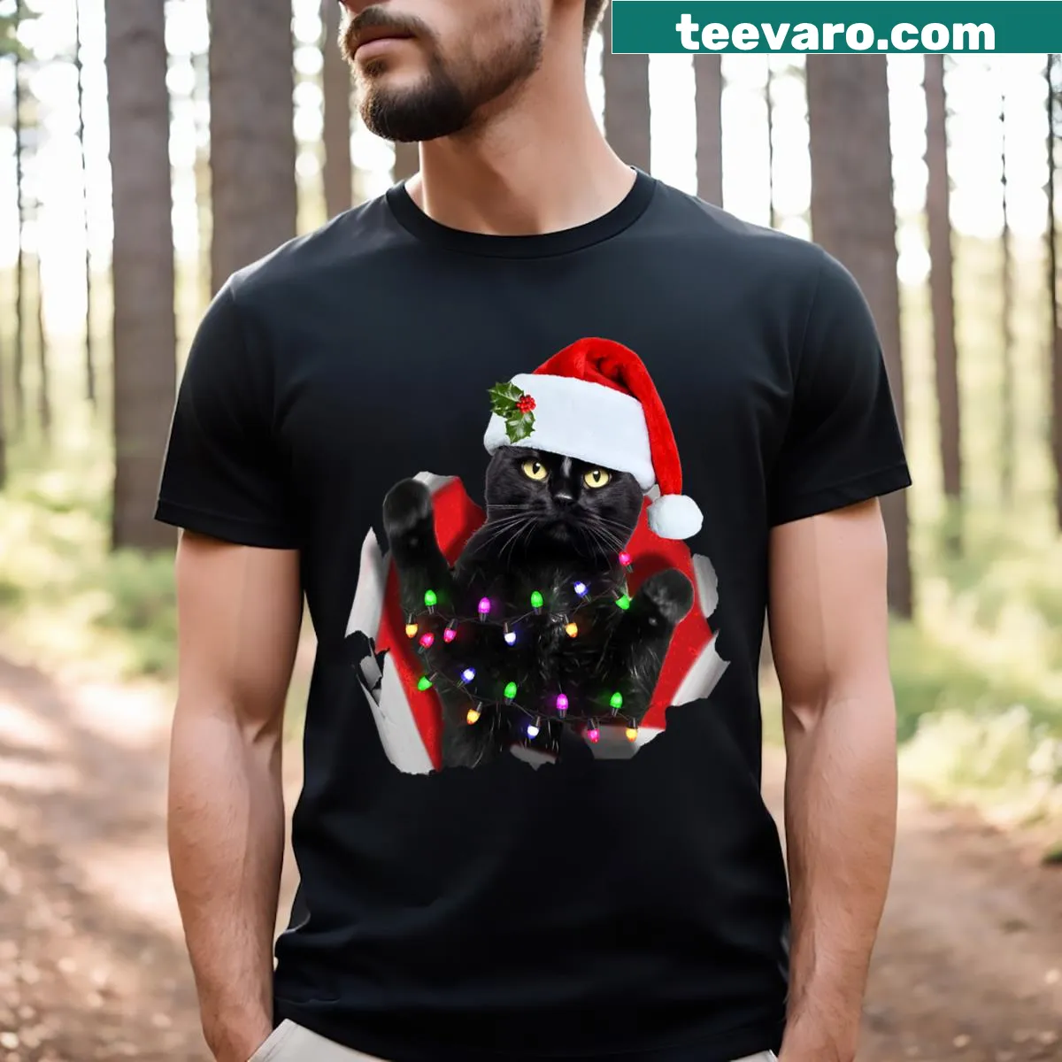 Funny Christmas t-shirt featuring a black cat in Santa hat — on a men's t-shirt