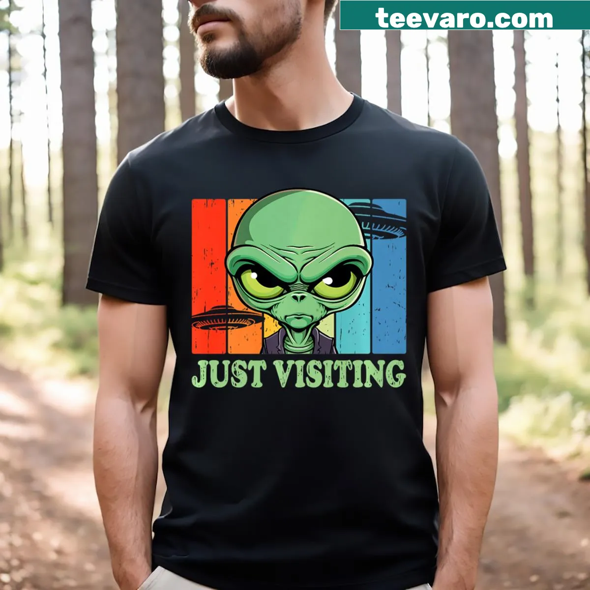 Playful t-shirt with UFO graphic and text about visiting Earth — on a men's t-shirt
