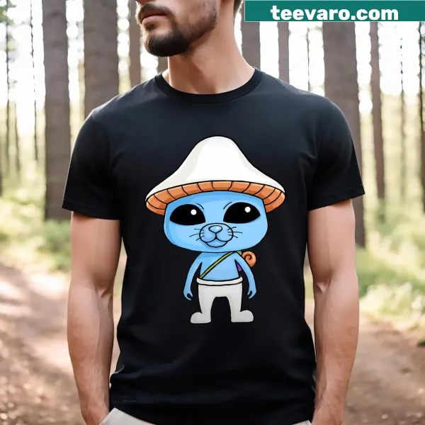 T-shirt featuring a blue mushroom and a cat meme with the phrase We Live We Love We Lie