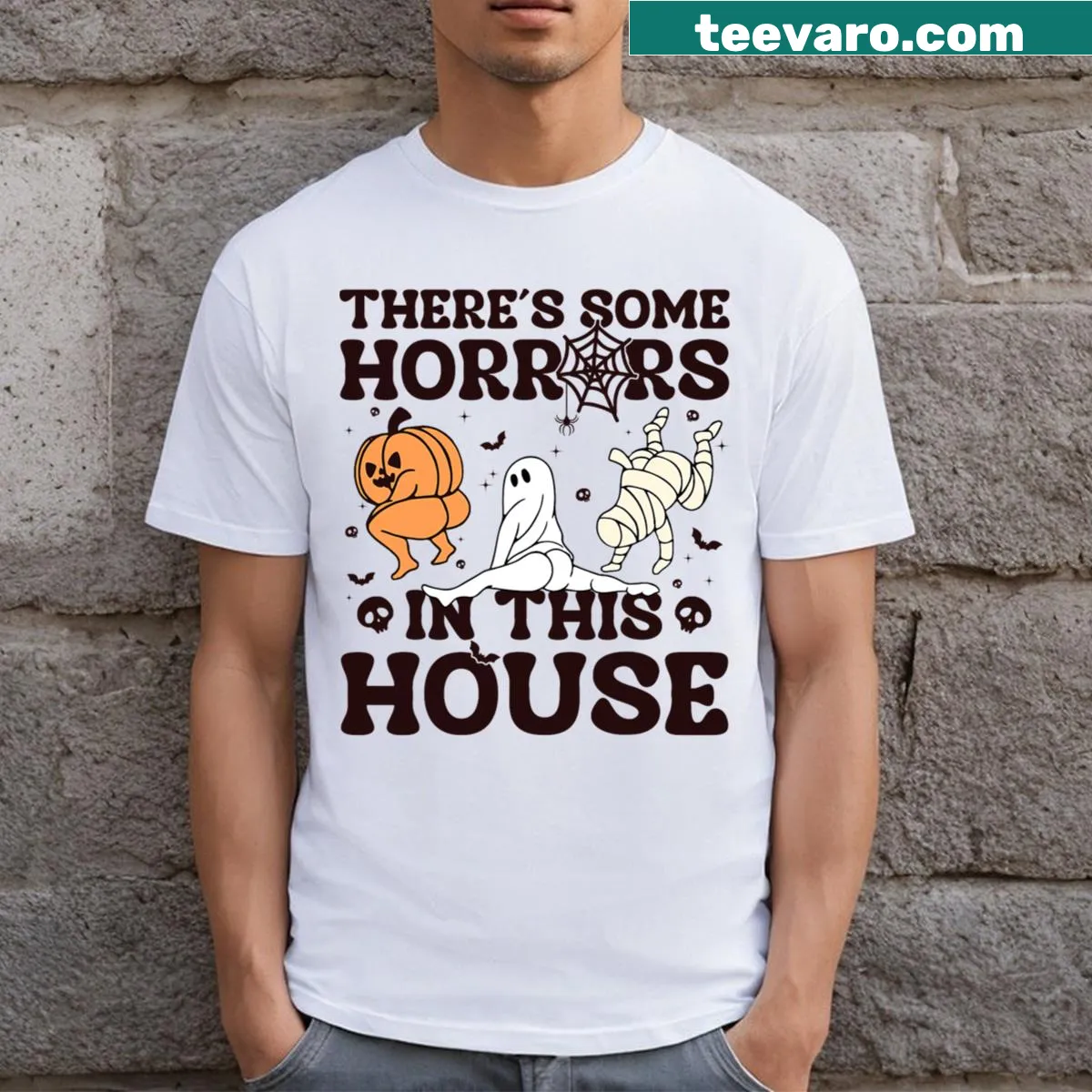Funny Halloween t-shirt with the text 'There's Some Horrors In This House' — on a men's t-shirt