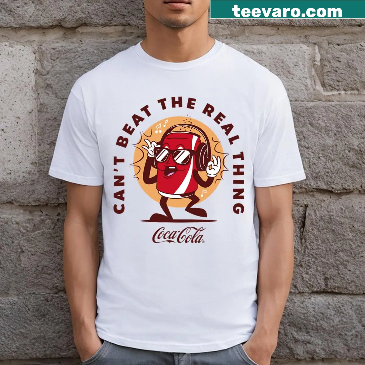 Retro Coca-Cola cartoon logo T-shirt with playful design — on a men's t-shirt