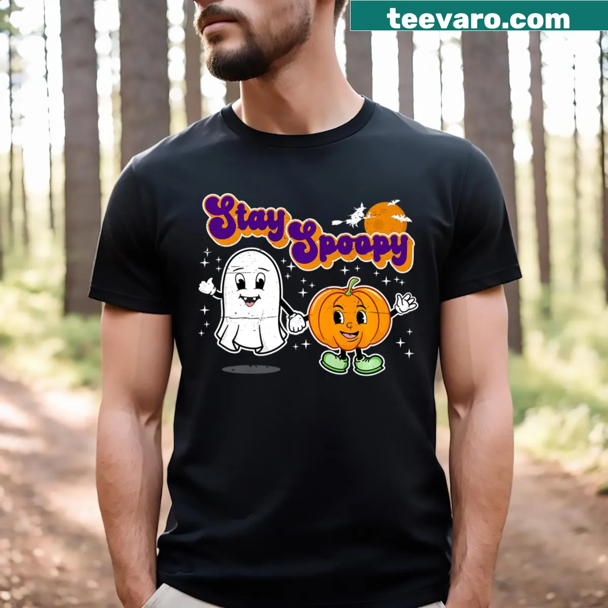 Distressed Halloween T-shirt with cartoon ghost and pumpkin. — on a men's t-shirt