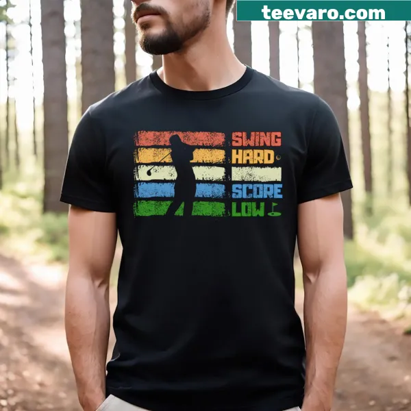 Funny golf T-shirt with 'Swing Hard Score Low' text.