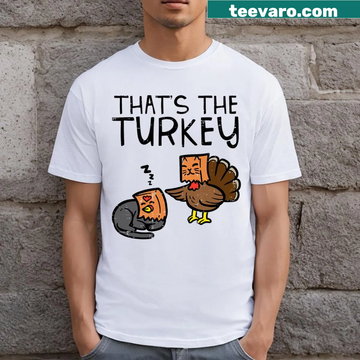 A playful t-shirt featuring a cat dressed as a turkey for Thanksgiving. — on a men's t-shirt